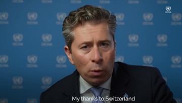 Example: the OCHA logo watermark in the top-right corner of an event video